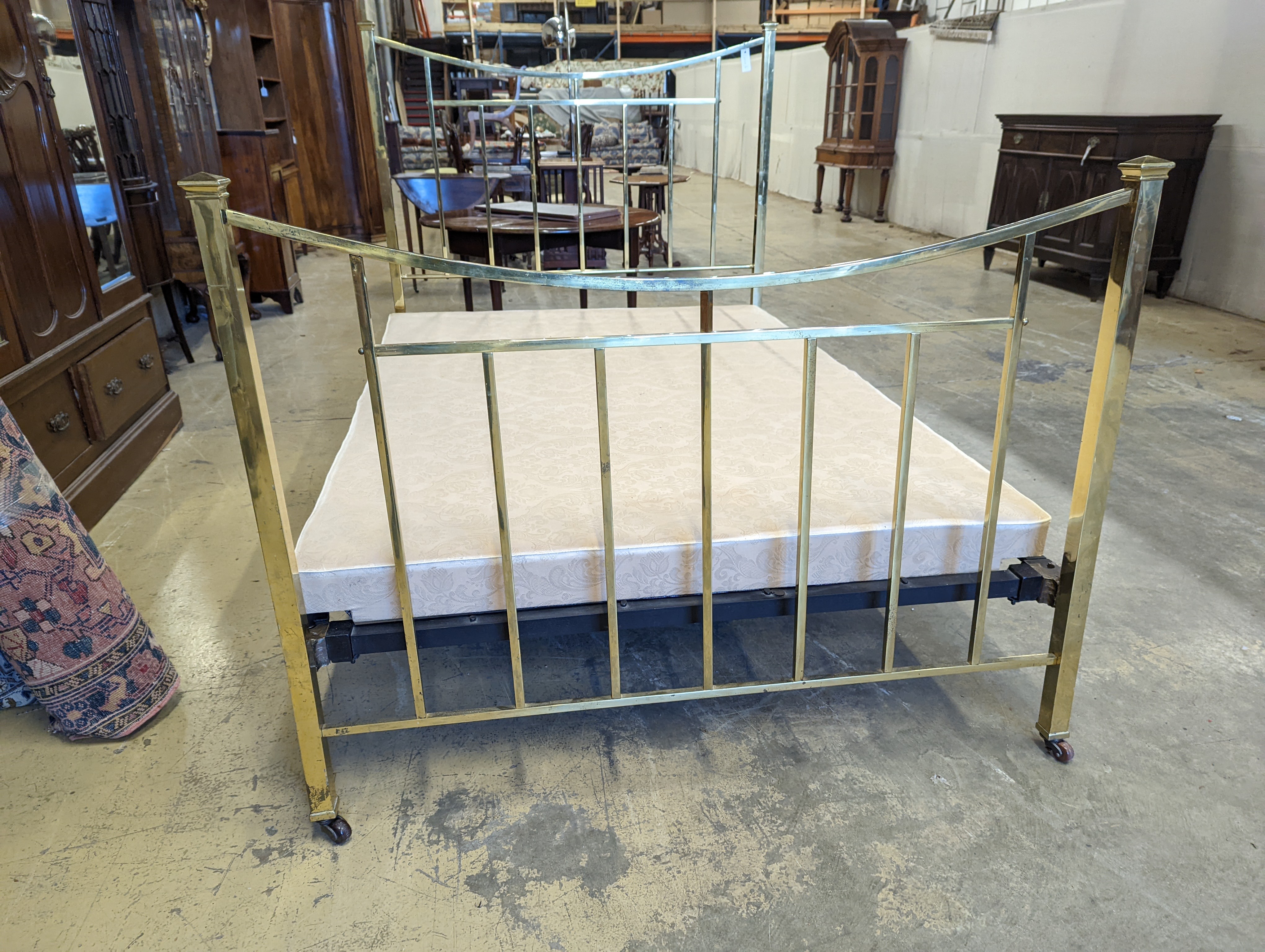 An Edwardian brass double bed frame, length 212cm, width 140cm
